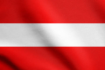 Flag of Austria waving in wind with fabric texture
