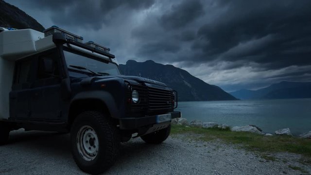off road camper van by a fjord