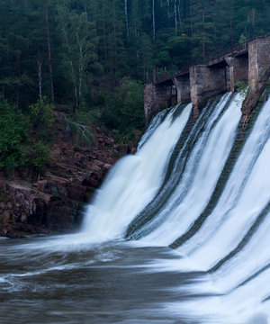 Water Flowing Down The Walls Of The Old Small Hydropower Plants