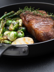 close up view of nice fresh steak on color background