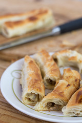 Sliced burek with meat on the plate