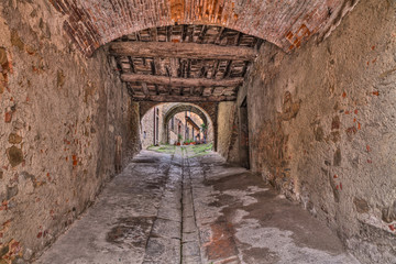 Fototapeta na wymiar Old alley in Castiglion Fiorentino, Arezzo, Tuscany, Italy