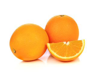 Sweet orange fruit with leaves on white