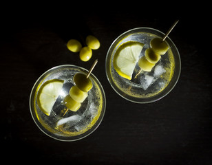 Martini with olives, lemon and ice