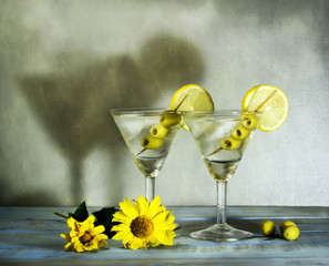 Martini with olives, lemon and ice