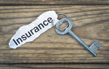Key with message Insurance