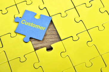 Obraz premium Puzzle with word Customer