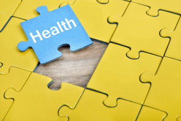 Fototapeta premium Puzzle with word Health