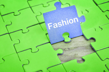 Fototapeta premium Puzzle with word Fashion