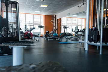Diverse training equipment at the gym room