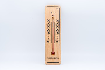 Wooden thermometer isolated on white background