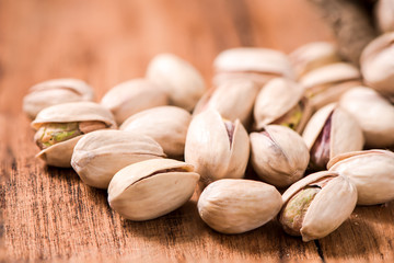 pistachios bean on wood table