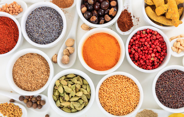 Bowls and spoons with spices