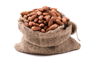 Almond in sack on white background