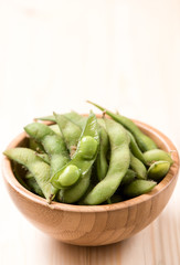 soybean in bowl on wood table