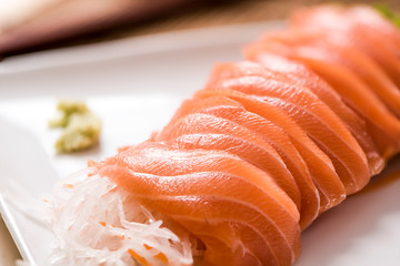 Salmon Sashimi in plate on wood table , japan food