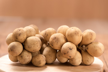 Lansium parasiticum on wood