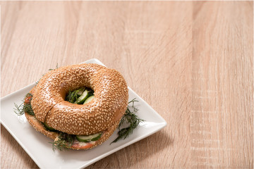 burger in plate on wood table