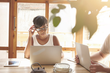 Productive teamwork in beautiful place indoors. Creative shot of youngsters working on their...