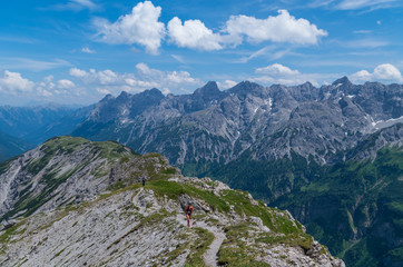 Naklejka premium Female trailrunning in the mountains of Allgau near Oberstdorf, Germany