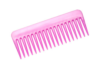 Pink plastic comb isolated on white