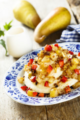 Dessert with pears, strawberry and granola