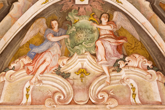 BRESCIA, ITALY - MAY 21, 2016: The fresco of angels as the symbol of cardinal virtue of Love in Chiesa di Santa Maria della Carita by Ferdinando Cairo and Luigi Vernazal from 18. cent.