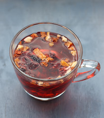 Red fruit tea in transparent glass Cup