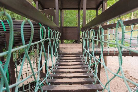 Playground with suspension bridge