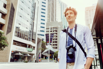 Male tourist in city