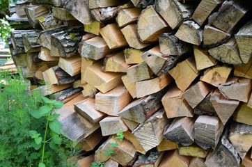 Natural wooden background - closeup of chopped firewood
