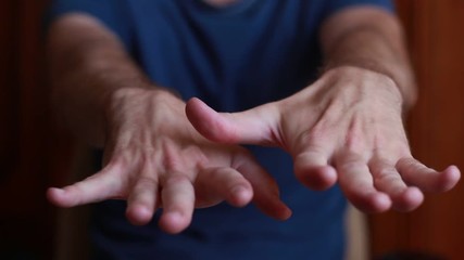 Man with tremored hands