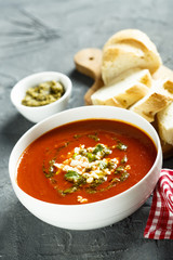 Tomato soup with cheese and pesto sauce