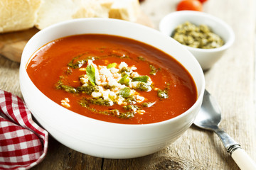 Tomato soup with cheese and pesto sauce