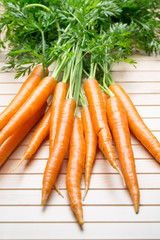 Fresh carrots on the gray backgrounds.