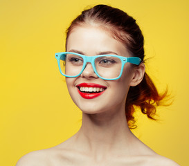 girl in blue glasses