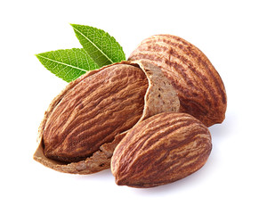 Obraz na płótnie Canvas Almonds kernel with leaves