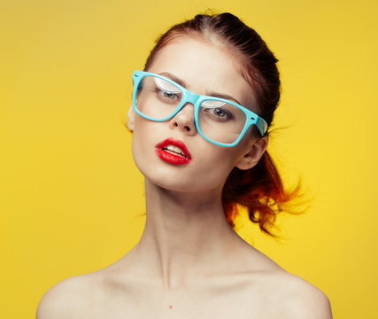 girl in blue glasses