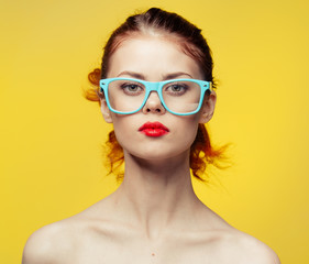 girl in blue glasses