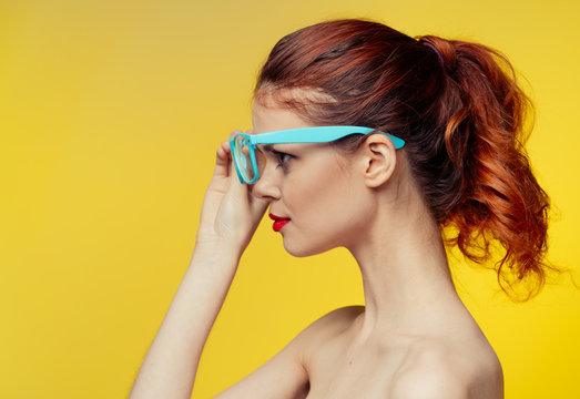 Woman In Blue Glasses