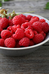 Bowl of fresh  raspberries close-up
