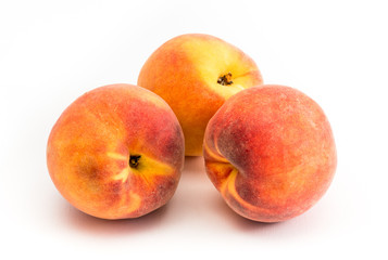Yellow peach isolated on white background