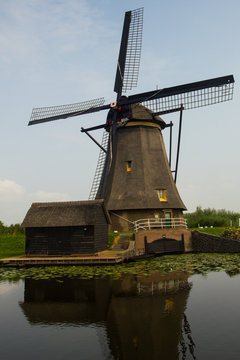 windmill reflected on water