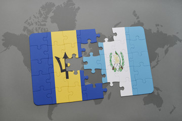 puzzle with the national flag of barbados and guatemala on a world map background.