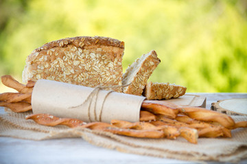loaf of bread on wooden background, food closeup