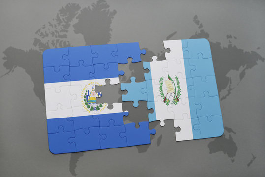 puzzle with the national flag of el salvador and guatemala on a world map background.