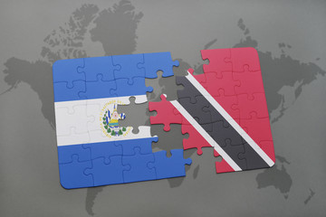 puzzle with the national flag of el salvador and trinidad and tobago on a world map background.