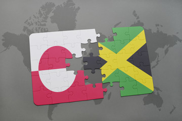puzzle with the national flag of greenland and jamaica on a world map background.