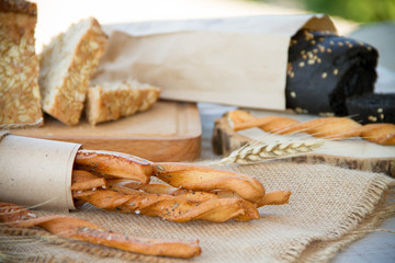 loaf of bread on wooden background, food closeup