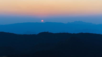 Silhouette on summit of Mon Kluy Hill, Tak province, Thailand